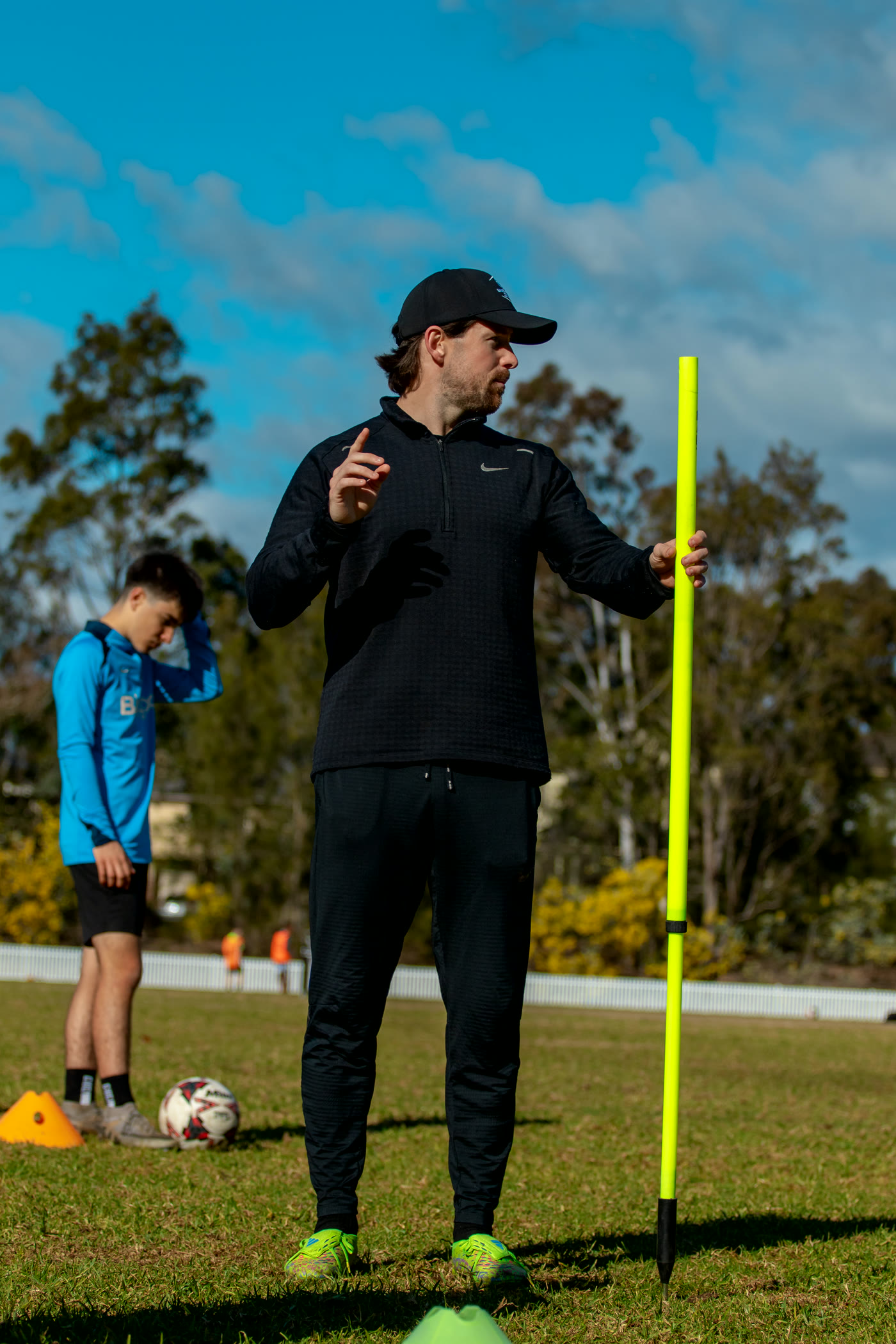 A coach directing a training session.