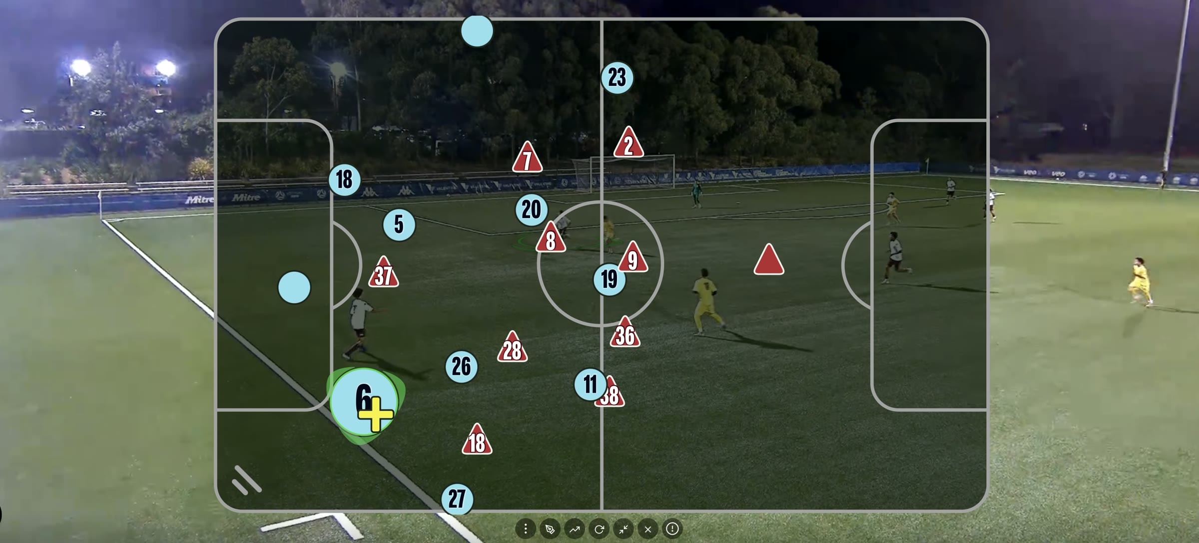 A tactical tracking overlay on match footage, showing player positioning during a night match.